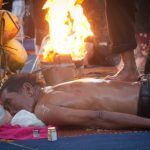 A Thai fire massage demonstration during the Ko Phangan Colourmoon Festival 2017