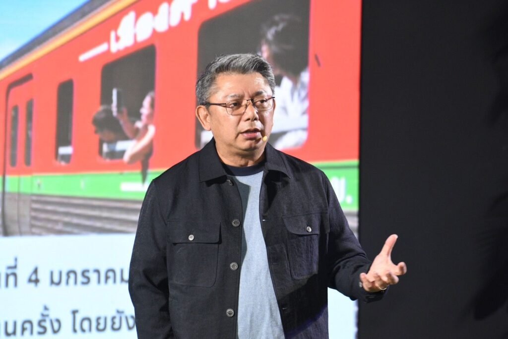 TAT executive delivering a keynote presentation on Thailand Tourism Next 2026, highlighting quality growth and long-haul market strategy.