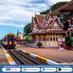 Train beside the historic royal pavilion at Hua Hin Railway Station